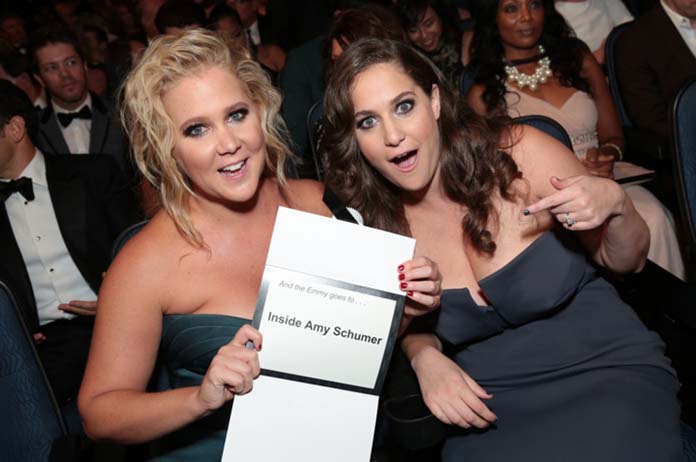 Amy Schumer and her sister Kim